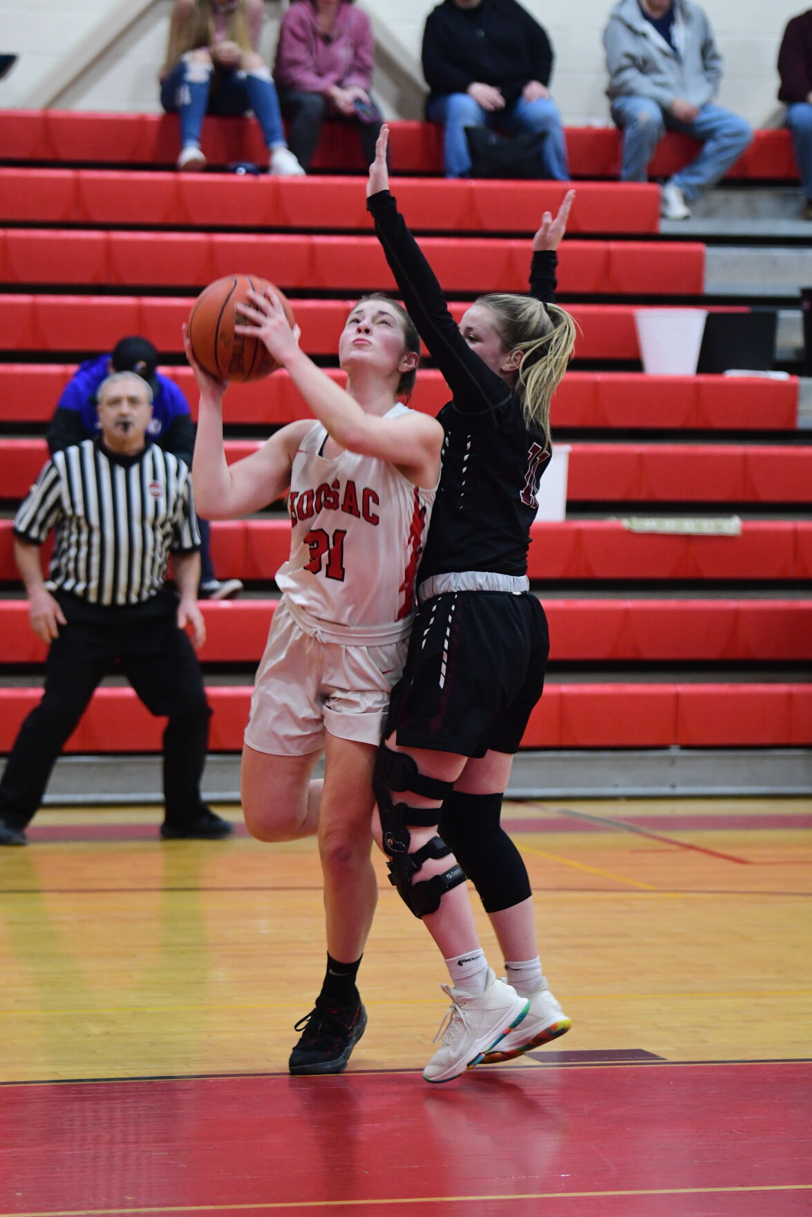 Avery McGrath shoots a layup